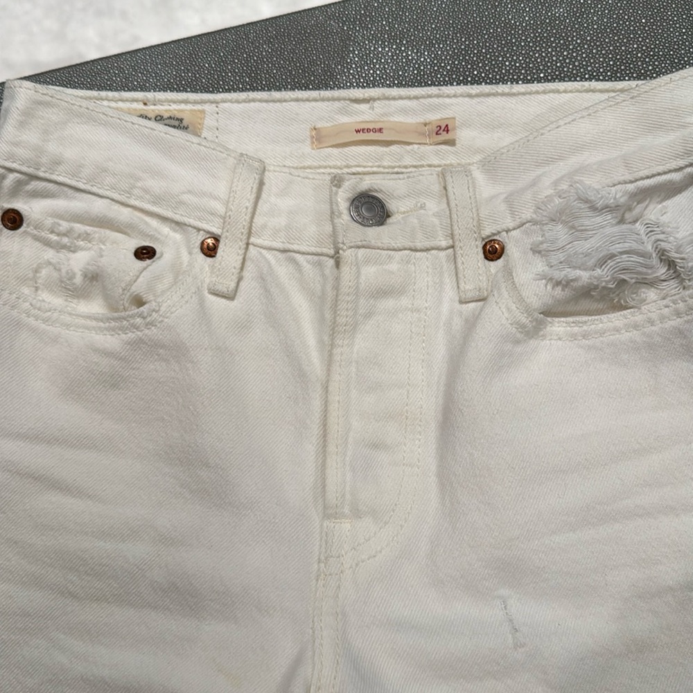 Levi’s white ripped jeans
